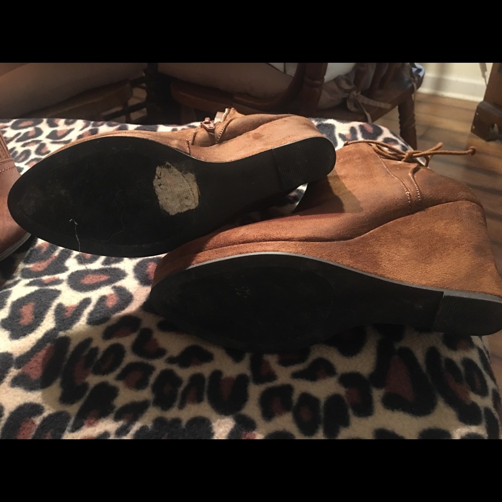 Two pair of cognac booties shoes